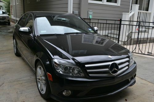 2009 black mercedes c350 4 door with perfect interior and exterior.