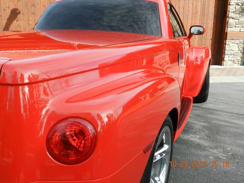 2006 red chevrolet ssr 6 speed, loaded w/options and extras, non smoker garaged