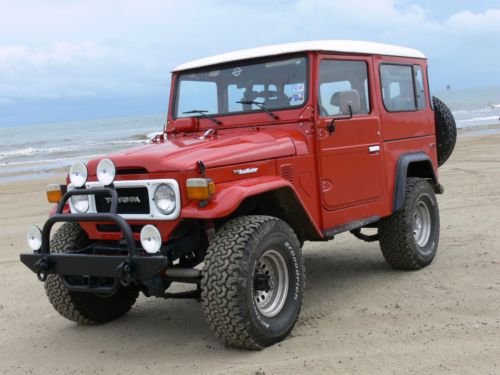 1979 toyota fj40 landcruiser,freeborn red,restored,2f engine,ac,power steering