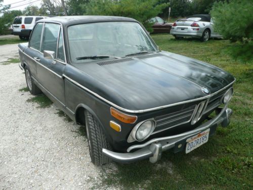 1972 bmw 2002 green/black/tan  4 speed very little rust still runs and drives