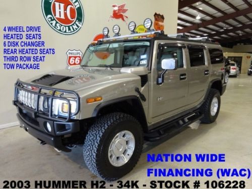 03 h2 suv,light bar,htd lth,bose,6 disk cd,3rd row seat,17in whls,34k,we finance