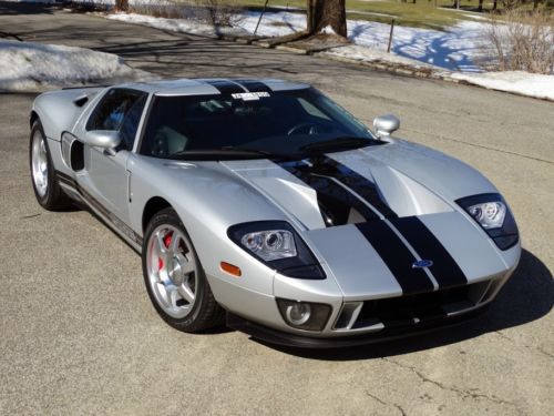 Quick silver with factory painted black stripes, 3076 miles and as-new!!