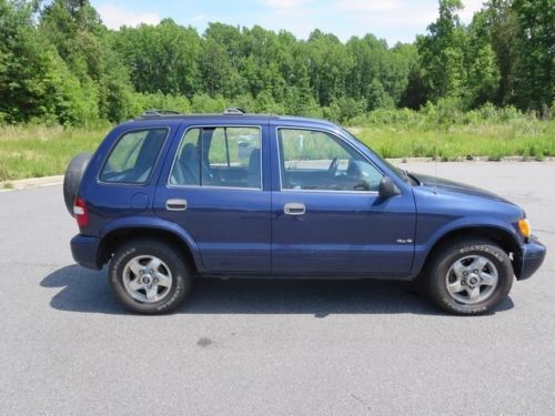 1999 sportage high bidder wins auction