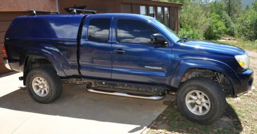 2005 4wd sr5 toyota tacoma crew cab 6-speed manual thule racks snug top lift kit