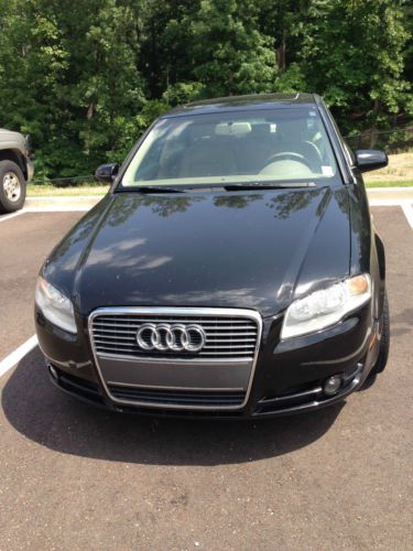 Audi a4- black with tan - great shape - priced to sell