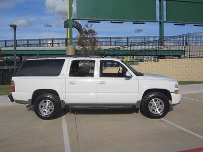 Look this nice 2004 suburban z71 4x4 texas own warranty available