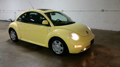 Yellow volkswagen beetle-new manual