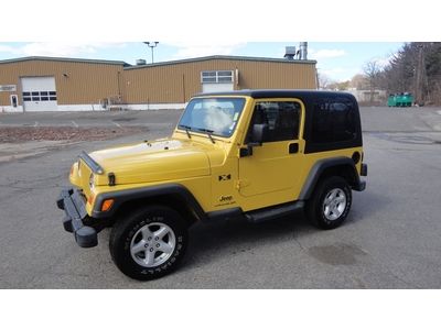 4.0l / 4x4 / 5-speed manual / hard-top / low miles / yellow / no reserve