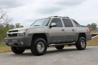 We finance! 02 avalanche 4x4 z71 | 4" lift | leather | loaded | super clean!