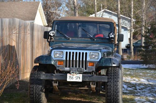 Yj jeep wrangler with lift kit, low miles