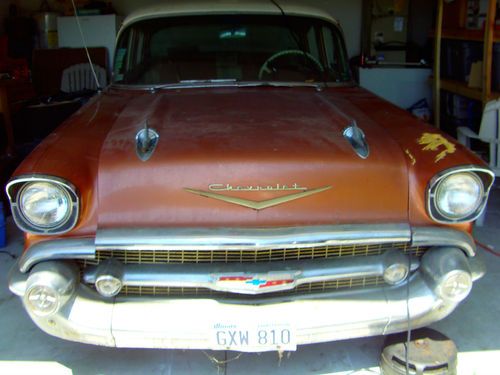 Cream and tan 57 chevy for parts or restoration. non-running