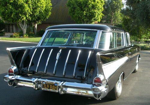 1957 nomad!  pristine onyx black beauty with rare rochester fuel injection.  wow