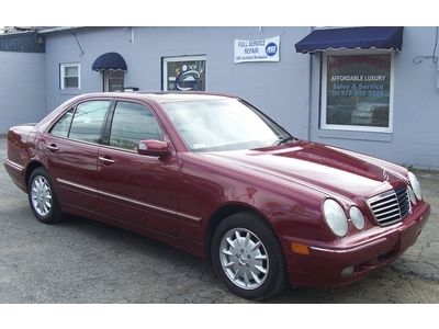 Low miles 70,305 red e320 4-matic luxuryleather sedan awd garage kept smoke free