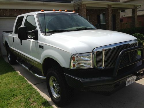 2000 ford f250 crew cab 4x4, new tires, 7.3 powerstroke. low reserve