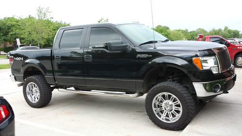 Custom ford f150 crew cab 4 by 4