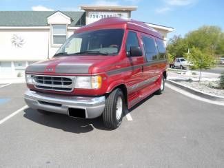 One owner low miles leather red gray automatic wheel chair accessible clean tv