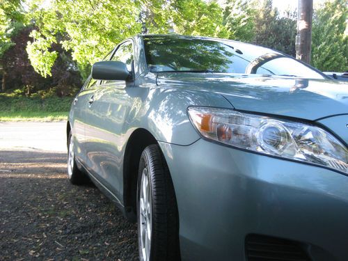 Almost new, 2011 toyota camry, 4 door le sedan (aloe green metallic)