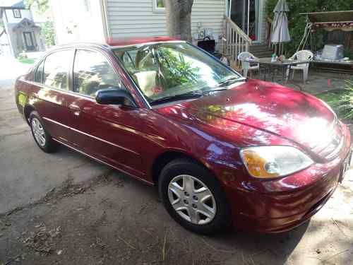 2003 honda civic lx sedan 4-door 1.7l 38 mpg hwy 29 mpg city