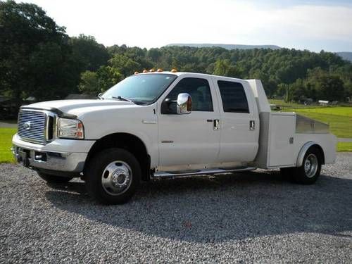 2006 ford f-350 4x4 crew cab w/ steel hauler/work body