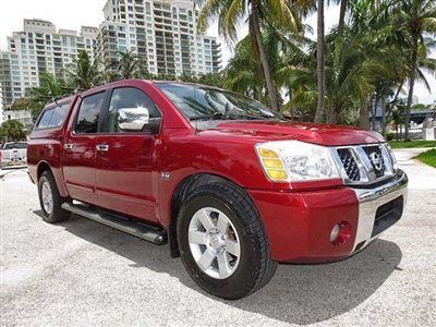Florida one owner nissan titan crew cab le leather topper 2wd super nice truck