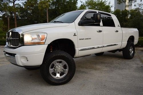 Ram 2500 mega cab laramie 4x4 5.9l diesel cummins nav,sunroof,back u p assist