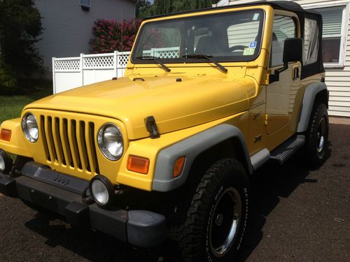 2002 jeep wrangler sport sport utility 2-door 4.0l 4x4 v6 5spd 31inch tires