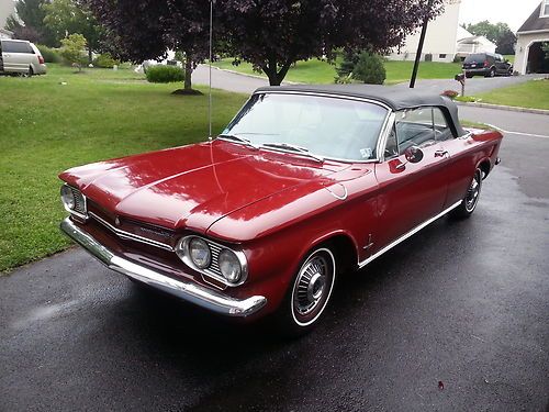 Red with black top and interior, air cooled flat 6, 4 speed, very fun car