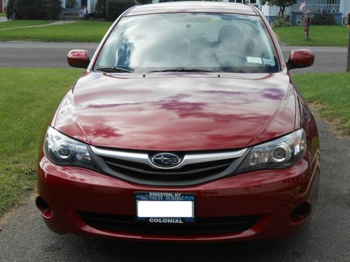 2011 subaru impreza 2.5i awd hatch back excellent condition $15,500. *low miles*