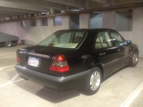 1998 c230 mercedes-benz blackw/tan int.,132,000miles,excellent condition,clean