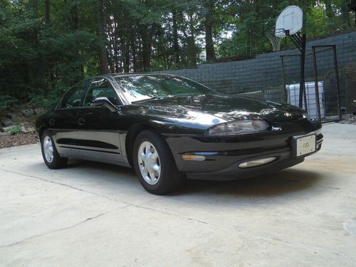 1999 oldsmobile aurora black on black beauty 102k miles bose 12-disc, moon roof