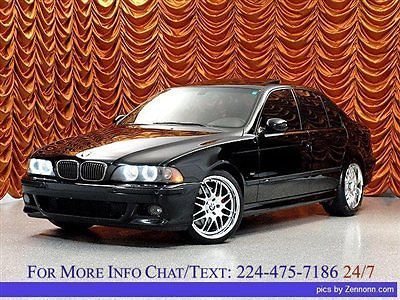 4 dr sedan manual gasoline 5.0l v8 fi dohc 32v carbon black metallic