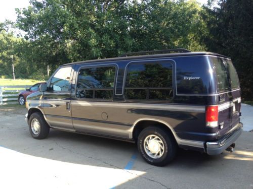 Explorer conversion van - blue, 4 door, quad captain chairs, tv/vcr combo