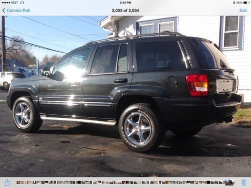 2004 jeep grand cherokee overland 4 x 4 in excellent condition warrantee avail.