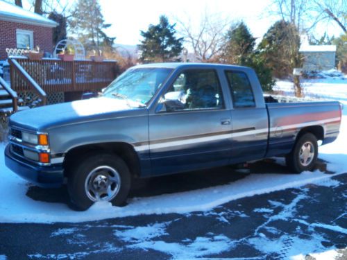 3 toned blue gmc sierra 1500 truck