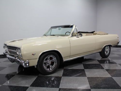 Beautiful cameo beige, soft leather interior, 350 ci v8, automatic show quality!