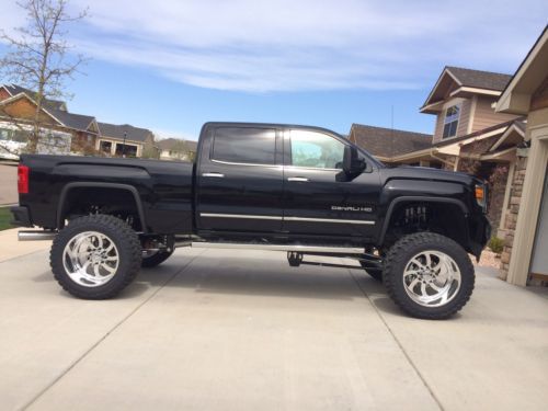 Lifted 2015 gmc denali -- 40 inch toyo mt -- 24 inch american force -- kelderman