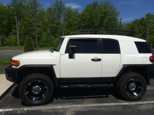 2013 iceburg white, lifted fj with custom black out kit and custom tires &amp; rims