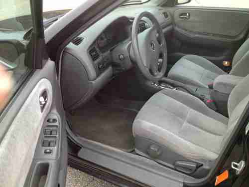 2002 Mazda 626 LX Sedan 4-Door 2.0L, image 2