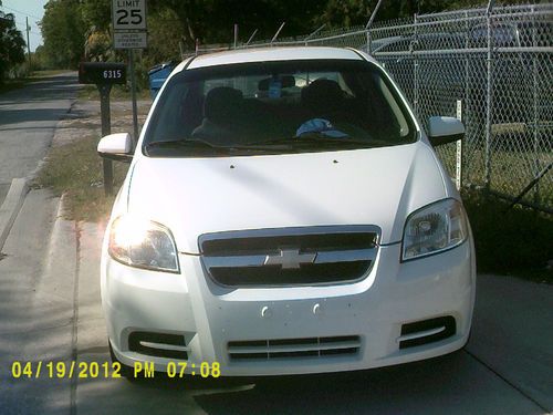 2009 chevrolet aveo lt sedan 4-door 1.6l save tousands no reserve!!!gas sipper