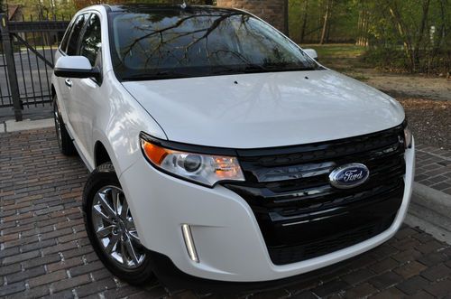 2011 edge sel.no reserve.leather/navi/panoroof/heated/chromes/sync/fogs/rebuilt