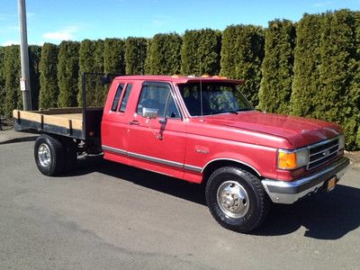 Ext. cab xlt, 2wd truck, 7.3 non turbo diesel, 8' flat bed "no reserve"