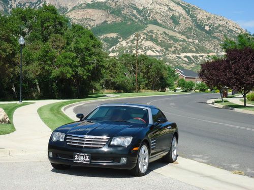 Black limited coupe with auto trans, factory navigation radio, leather interior