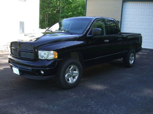 2002 black dodge ram 1500 quad cab 4wd pickup truck 5.9l