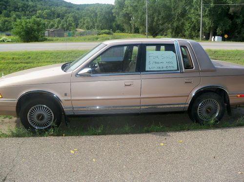 1990 168604 miles 3.0 engine 25 mpg, tan landau roof, nice interior