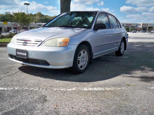 2002 honda civic lx,auto,pwr pkg,35 mpg,runs drives gr8,wow look $99 no reserve