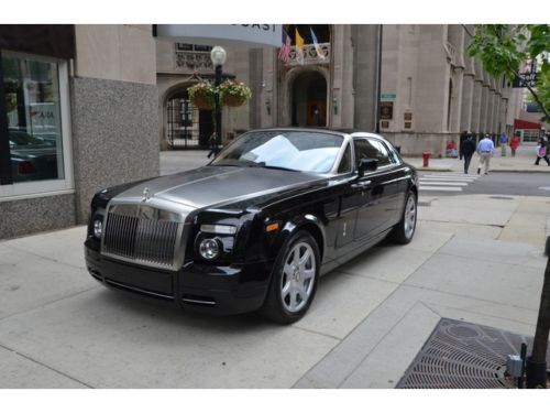 2009 rolls royce phantom coupe.  diamond black with mocassin.