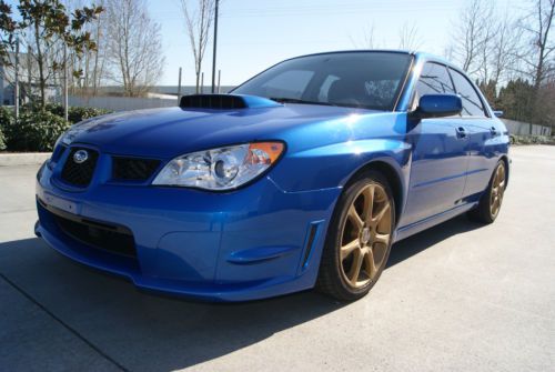 2007 subaru impreza wrx sedan. world rally blue. excellent shape. full exhaust!