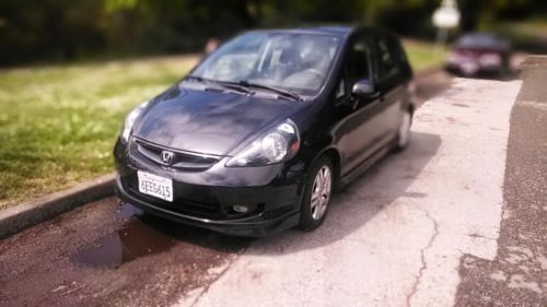 2007 honda fit sport: black 4-door hatchback. low mileage, good condition