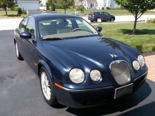 Dark blue, well maintained,4 door sedan,navigation system,dvd system much more