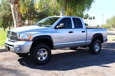 4dr quad cab 140.5 4wd laramie truck diesel 5.9l l6 dir turbo bright silver meta